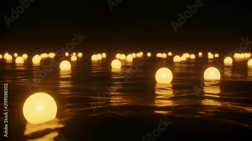 夜の水面に浮かび漂う無数の灯籠