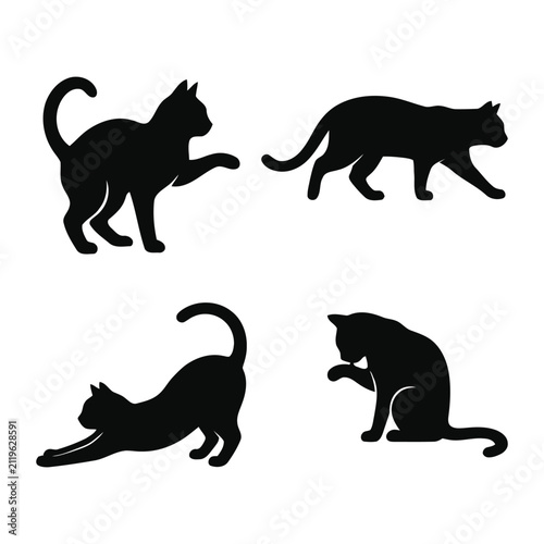 Set of four black cat silhouettes in different poses isolated on a white background