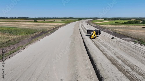 Aerial view of highway construction site.
Captivating Aerial Footage of Expansive Highway Under Construction, Unveiling Progress and Development from the Sky.
