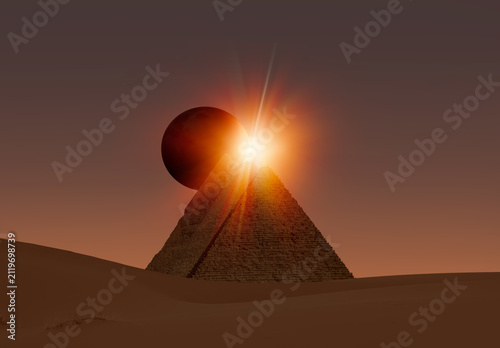 Giza Pyramid Complex at amazing sunset sky with Solar Eclipse - Cairo, Egypt