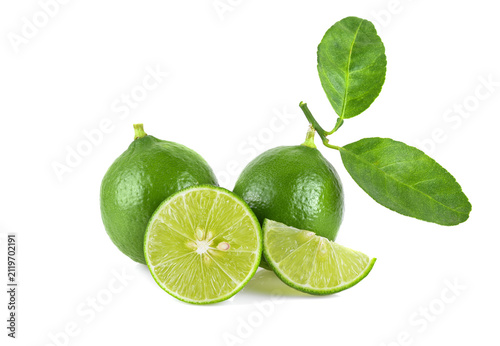 Lime fruit with leaves isolated on white background