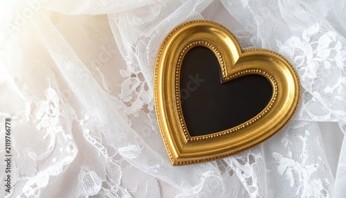 Antique Black and Gold Heart Picture Frame Resting on Delicate White Lace Cloth Background