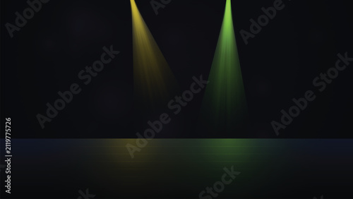 Empty performance platform with yellow and green stage lights, spotlight