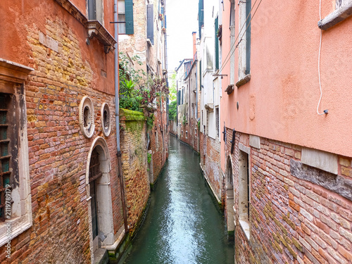 Obraz na plátne City of Venice, canal, bridge, gondola boats, alley and colorful local buildings