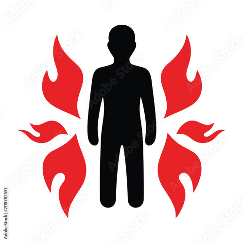 person silhouette surrounded by flames