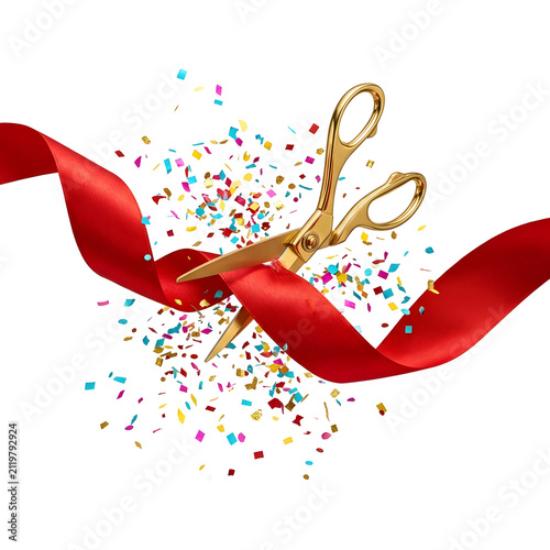 Golden metal scissors cutting through a vibrant red silk ribbon during a festive grand opening event with colorful floating confetti