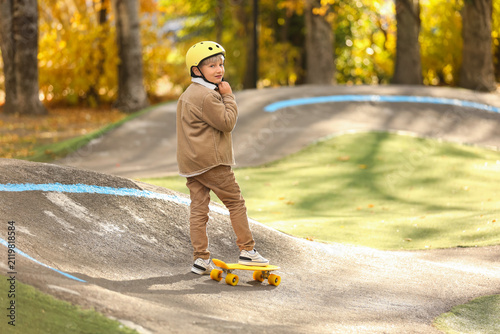 Little boy with helmet and ...