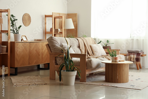 Sofa, table and houseplants...