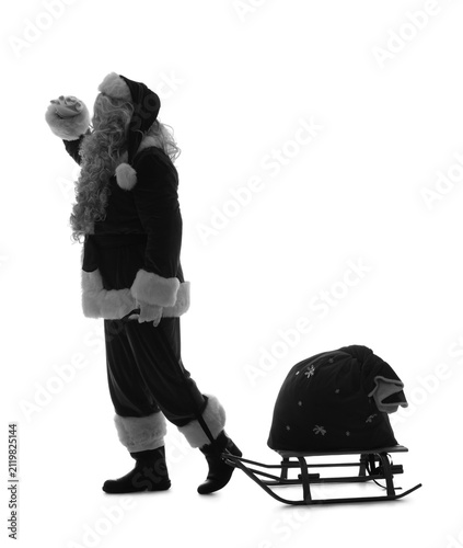 Silhouette of Santa Claus w...