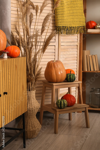 Different pumpkins on stepl...
