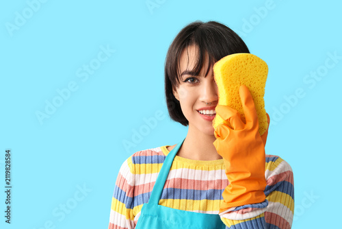 Young woman with sponge on ...