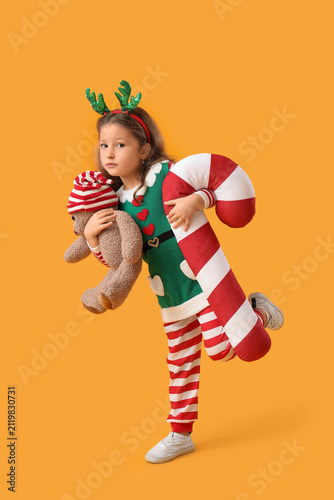Cute little girl with teddy...