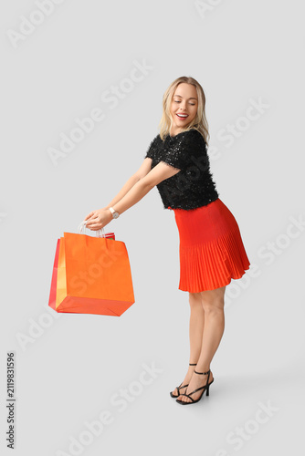 Young woman with shopping b...