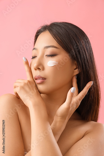 Beautiful Asian woman with ...