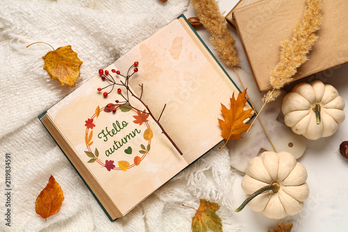 Open book with "hello autum...