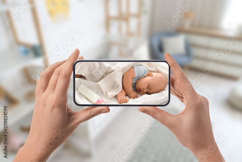 Hands holding a smartphone ...