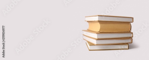 Stack of four brown hardcov...