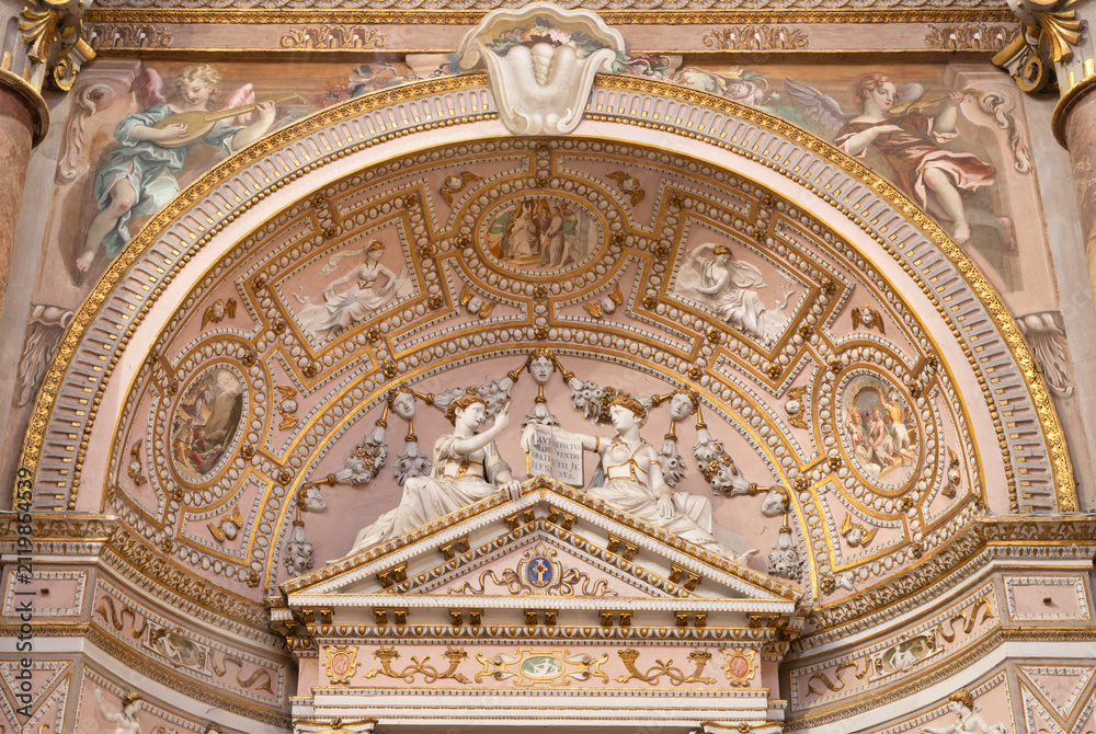 Fototapeta premium CREMA, ITALY - MARCH 20, 2026: The stucco of side altar in the church Santuario di Santa Maria della Croce by Giovan Battista Castello from year (1585)