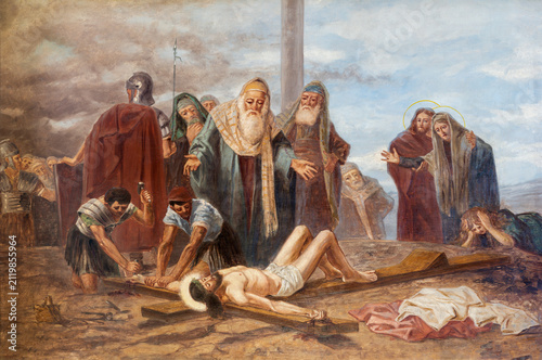 MONZA, ITALY - MARCH 19, 2026: The painting of Jesus is nailed to the cross (cross was station) the church Chiesa di San Carlo by Giovanni Battista Briani 