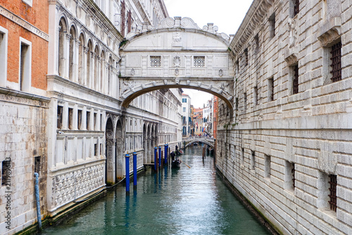 Bild auf Leinwand The bridge of sighs and the city of Venice with canal street, bridge, boats, gon