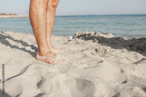 feet on the beach
