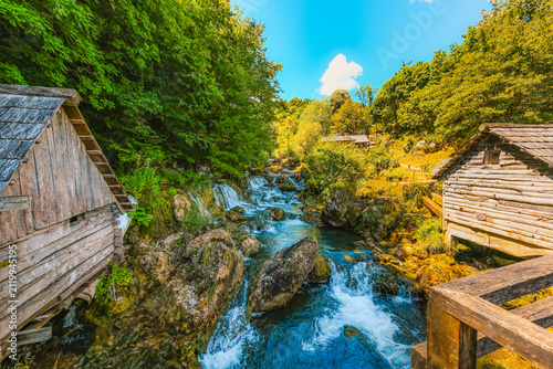 Canvastavla Traditional wooden watermills on the Krupa river waterfalls, a scenic rural landscape near Banja Luka, Bosnia and Herzegovina