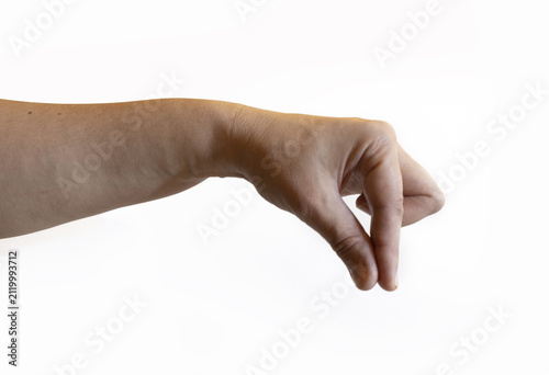Fotografie Human hand with fingers bent downward and thumb touching the index finger on a white background