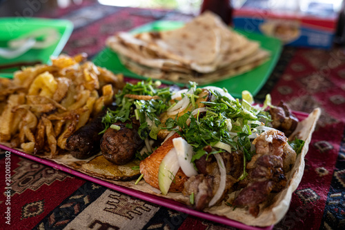 Traditional Armenian Khorovats Grilled Meat Kebabs with Herbs and Lavash