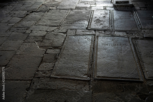 Ancient Inscribed Gravestones on Stone Floor inside Armenian Monastery