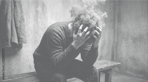 Fotografía Man struggling with stress and mental health issues, black and white