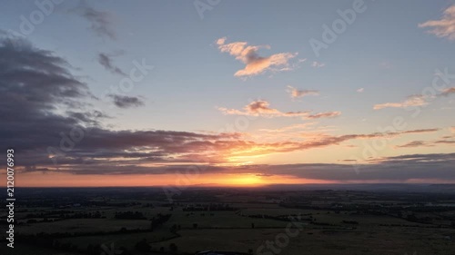 Aerial Hyperlapse of Sunrise Over Irish Countryside Fields
