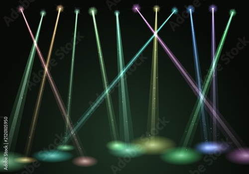 Принти на полотні Colorful laser lights creating x patterns on dark stage
