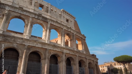 Roman Colosseum exterior under clear blue sky