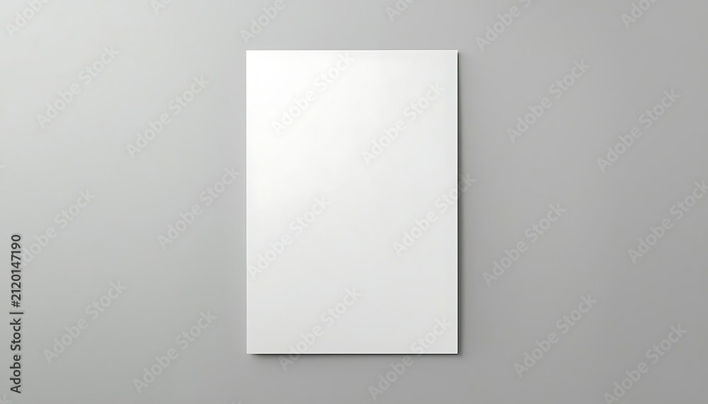 Fototapeta premium Blank white paper sheet mockup on a grey background