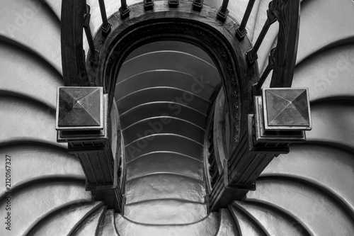 Принти на полотні A top view of a spiral staircase, distinguished by its pronounced asymmetry and geometric lines