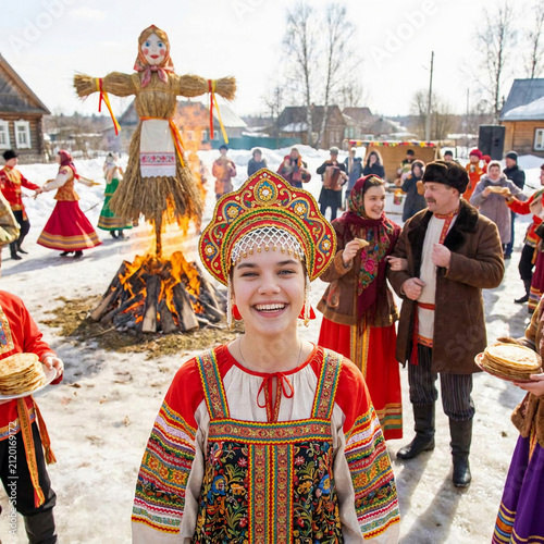 The traditional Slavic folk holiday of Maslenitsa. Russian girl in a kokoshnik and a sarafan
