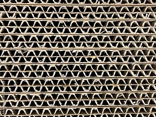 Foto Corrugated cardboard sheet paper pattern texture closeup macro
