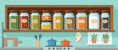 Kitchen shelf with jars of spices and cooking utensils.
