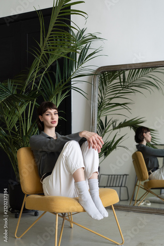 Portrait of a beautiful young woman in a studio