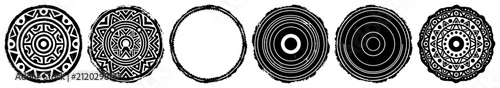 Circular ethnic ornaments and tribal decorative rings in black and white graphic style