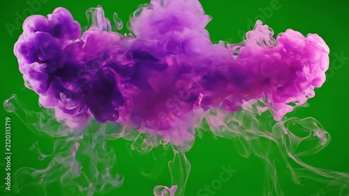 Colorful swirls of purple and pink smoke rising and drifting against a bright green screen background for video overlay