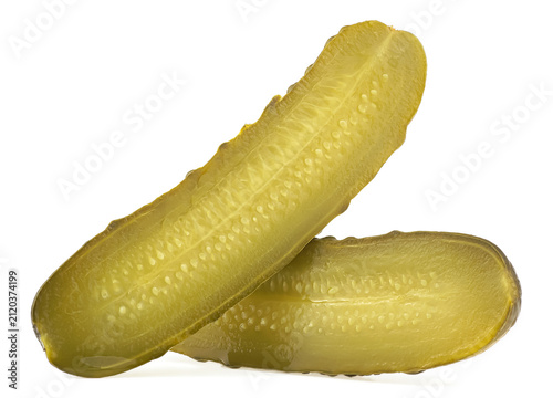 Foto Fresh gherkins - two pieces of tasty pickled cucumber slices isolated on a white background
