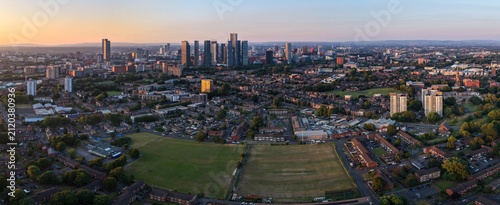 Фотография Panoramic Aerial View Over St Bride's Sports Fields and Manchester Skyline at Sunset