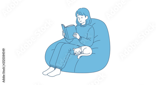 Young woman reading book on bean bag with pet cat