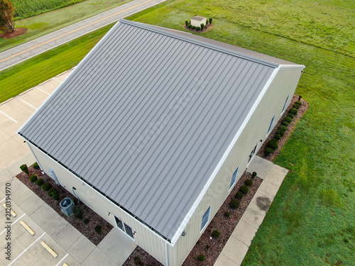 Aerial View Of Modern Grey Standing Seam Metal Roof On Commercial Building
