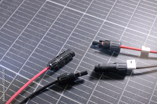 MC4 connectors sitting on a portable solar panel