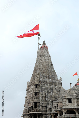 Majestic shikhara of Dwarkadhish Temple with religious flag in Dwarka, Gujarat