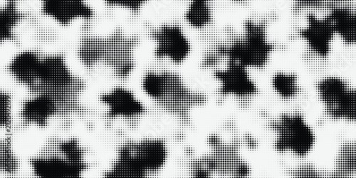 Monochrome halftone background with abstract organic cow skin spot pattern eps10