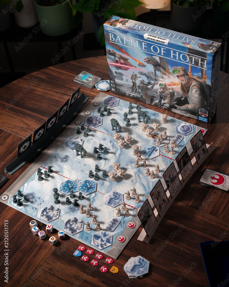 Fototapeta premium Portrait product photography of Star Wars Battle of Hoth board game with components and box displayed with dramatic lighting