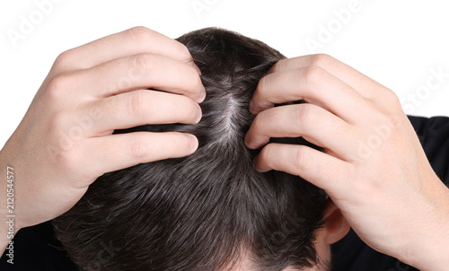 Quadro su tela Man examining his head on white background, closeup